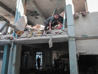 A picture shows the destruction caused by an Israeli army attack on the Al-Falah school where Palestinians take shelter, killing and woundin...