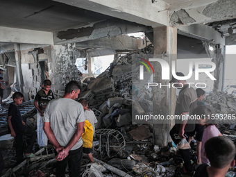 A picture shows the destruction caused by an Israeli army attack on the Al-Falah school where Palestinians take shelter, killing and woundin...