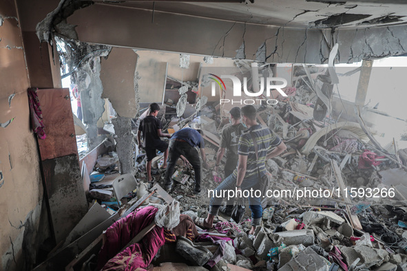 A picture shows the destruction caused by an Israeli army attack on the Al-Falah school where Palestinians take shelter, killing and woundin...