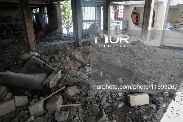 A picture shows the destruction caused by an Israeli army attack on the Al-Falah school where Palestinians take shelter, killing and woundin...