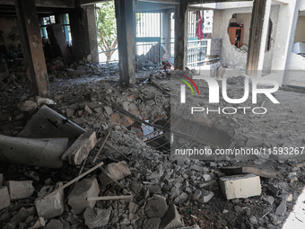 A picture shows the destruction caused by an Israeli army attack on the Al-Falah school where Palestinians take shelter, killing and woundin...