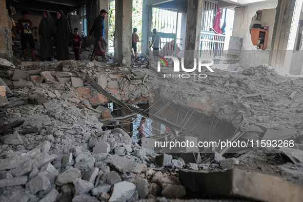 A picture shows the destruction caused by an Israeli army attack on the Al-Falah school where Palestinians take shelter, killing and woundin...