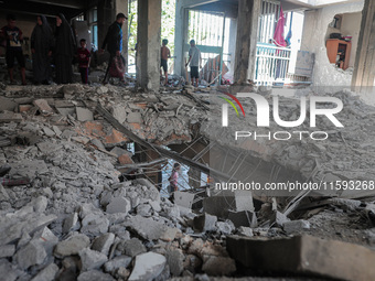 A picture shows the destruction caused by an Israeli army attack on the Al-Falah school where Palestinians take shelter, killing and woundin...