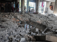 A picture shows the destruction caused by an Israeli army attack on the Al-Falah school where Palestinians take shelter, killing and woundin...