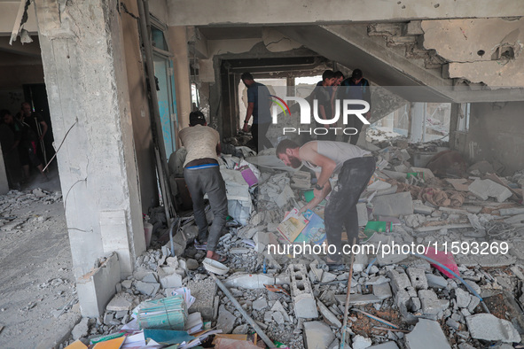 A picture shows the destruction caused by an Israeli army attack on the Al-Falah school where Palestinians take shelter, killing and woundin...