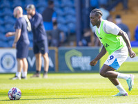 Tanto Olaofe #9 of Stockport County F.C. warms up during the Sky Bet League 1 match between Stockport County and Leyton Orient at the Edgele...