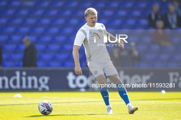 Will Collar #14 of Stockport County F.C. warms up during the Sky Bet League 1 match between Stockport County and Leyton Orient at the Edgele...