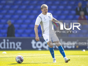 Will Collar #14 of Stockport County F.C. warms up during the Sky Bet League 1 match between Stockport County and Leyton Orient at the Edgele...