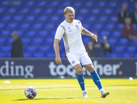 Will Collar #14 of Stockport County F.C. warms up during the Sky Bet League 1 match between Stockport County and Leyton Orient at the Edgele...