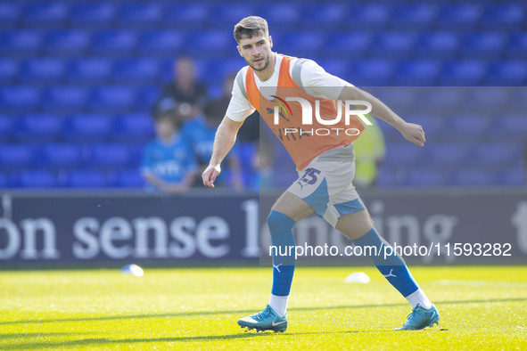 Ethan Pye #15 of Stockport County F.C. warms up during the Sky Bet League 1 match between Stockport County and Leyton Orient at the Edgeley...