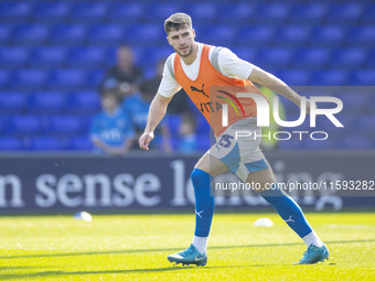 Ethan Pye #15 of Stockport County F.C. warms up during the Sky Bet League 1 match between Stockport County and Leyton Orient at the Edgeley...