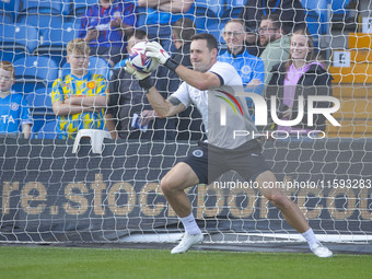 Ben Hinchliffe #1 (GK) of Stockport County F.C. warms up during the Sky Bet League 1 match between Stockport County and Leyton Orient at the...