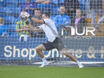 Ben Hinchliffe #1 (GK) of Stockport County F.C. warms up during the Sky Bet League 1 match between Stockport County and Leyton Orient at the...