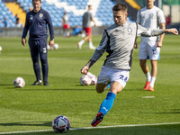 Oliver Norwood #26 of Stockport County F.C. warms up during the Sky Bet League 1 match between Stockport County and Leyton Orient at the Edg...