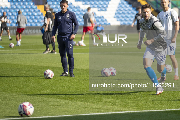 Oliver Norwood #26 of Stockport County F.C. warms up during the Sky Bet League 1 match between Stockport County and Leyton Orient at the Edg...