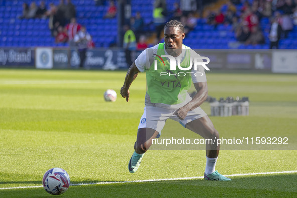 Tanto Olaofe #9 of Stockport County F.C. warms up during the Sky Bet League 1 match between Stockport County and Leyton Orient at the Edgele...