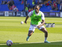 Tanto Olaofe #9 of Stockport County F.C. warms up during the Sky Bet League 1 match between Stockport County and Leyton Orient at the Edgele...