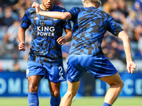 James Justin of Leicester City (facing camera) drills with Victor Kristiansen during the warm-up for the Premier League match between Leices...