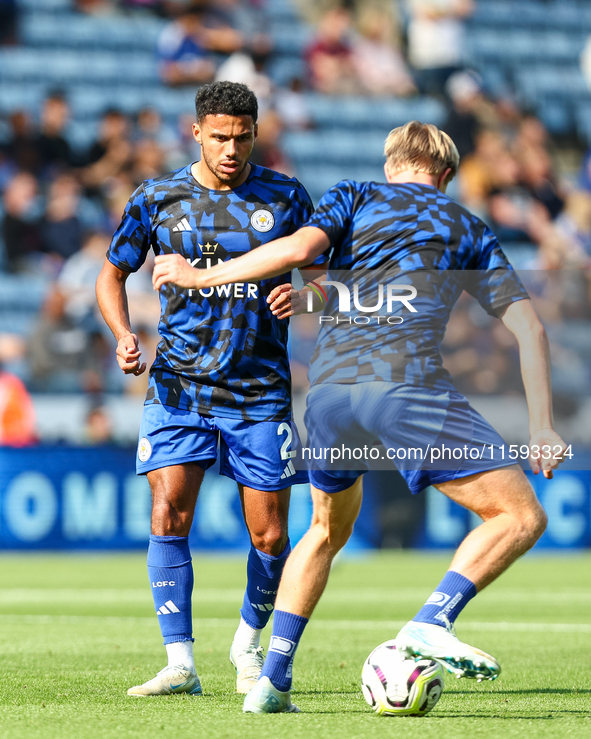 James Justin of Leicester City (facing camera) drills with Victor Kristiansen during the warm-up for the Premier League match between Leices...