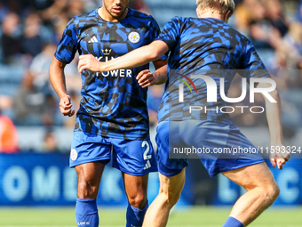 James Justin of Leicester City (facing camera) drills with Victor Kristiansen during the warm-up for the Premier League match between Leices...