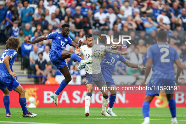 Wilfred Ndidi of Leicester City battles for possession with Dwight McNeil of Everton during the Premier League match between Leicester City...