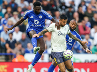 Wilfred Ndidi of Leicester City battles for possession with Dwight McNeil of Everton during the Premier League match between Leicester City...