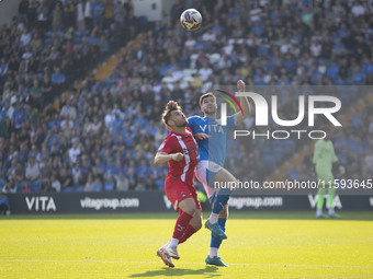 Ethan Pye #15 of Stockport County F.C. heads the ball during the Sky Bet League 1 match between Stockport County and Leyton Orient at the Ed...