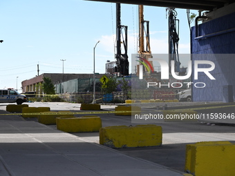 The NYPD investigates and expands the crime scene to an underpass near the site of a mass shooting on Stewart Avenue and Cherry Street in Br...