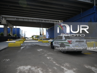 The NYPD investigates and expands the crime scene to an underpass near the site of a mass shooting on Stewart Avenue and Cherry Street in Br...