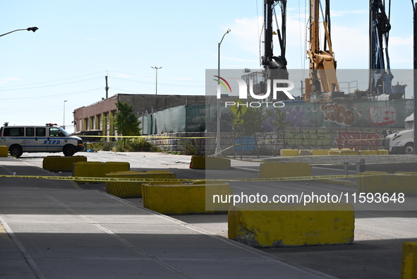 The NYPD investigates and expands the crime scene to an underpass near the site of a mass shooting on Stewart Avenue and Cherry Street in Br...