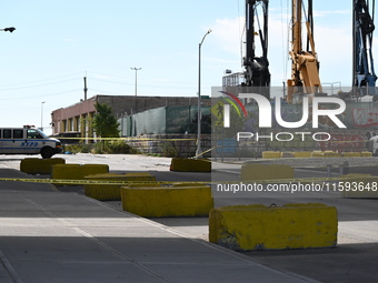 The NYPD investigates and expands the crime scene to an underpass near the site of a mass shooting on Stewart Avenue and Cherry Street in Br...