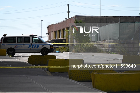 The NYPD investigates and expands the crime scene to an underpass near the site of a mass shooting on Stewart Avenue and Cherry Street in Br...