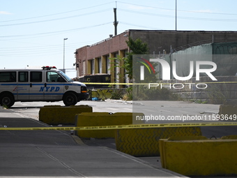 The NYPD investigates and expands the crime scene to an underpass near the site of a mass shooting on Stewart Avenue and Cherry Street in Br...