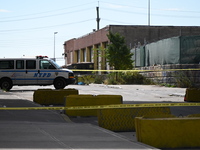 The NYPD investigates and expands the crime scene to an underpass near the site of a mass shooting on Stewart Avenue and Cherry Street in Br...