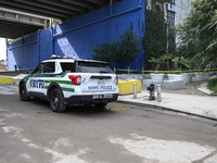 The NYPD investigates and expands the crime scene to an underpass near the site of a mass shooting on Stewart Avenue and Cherry Street in Br...