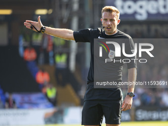 Referee Adam Herczeg officiates the Sky Bet League 1 match between Stockport County and Leyton Orient at the Edgeley Park Stadium in Stockpo...