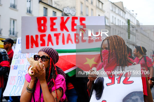 People during a protest against the ''Macron-Barnier'' government, in Paris, on September 21, 2024. France's new premier said he hoped to fi...