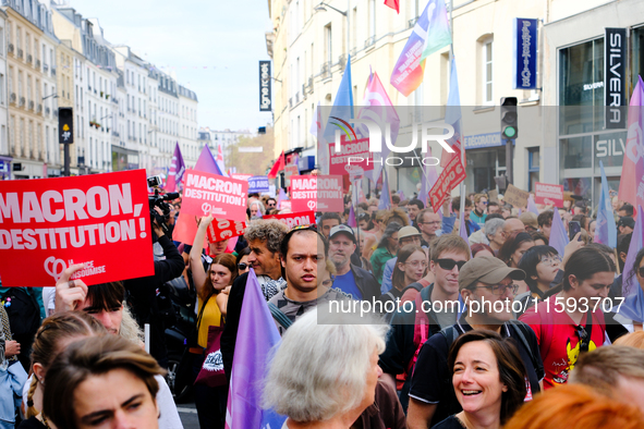 People during a protest against the ''Macron-Barnier'' government, in Paris, on September 21, 2024. France's new premier said he hoped to fi...