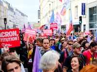 People during a protest against the ''Macron-Barnier'' government, in Paris, on September 21, 2024. France's new premier said he hoped to fi...