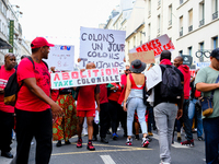 People during a protest against the ''Macron-Barnier'' government, in Paris, on September 21, 2024. France's new premier said he hoped to fi...