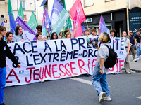 People during a protest against the ''Macron-Barnier'' government, in Paris, on September 21, 2024. France's new premier said he hoped to fi...