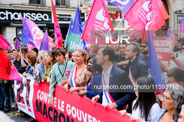 People during a protest against the ''Macron-Barnier'' government, in Paris, on September 21, 2024. France's new premier said he hoped to fi...