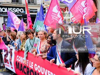 People during a protest against the ''Macron-Barnier'' government, in Paris, on September 21, 2024. France's new premier said he hoped to fi...