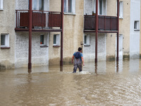 A man walks in the water after Nysa Klodzka river flooded town of Lewin Brzeski in southwestern Poland, on September 19th, 2024. Storm Boris...