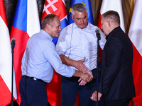 Polish Prime Minister Donald Tusk, Austrian Chacellor Karl Nehammer and Slovak Prime Minister Robert Fico attend a press conference at the t...