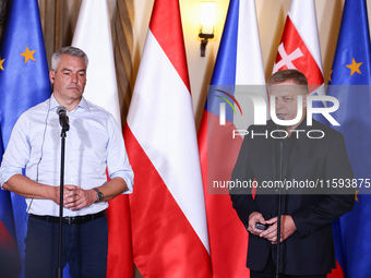 Austrian Chacellor Karl Nehammer and Slovak Prime Minister Robert Fico attend a press conference at the town hall in in Wroclaw, Poland on S...