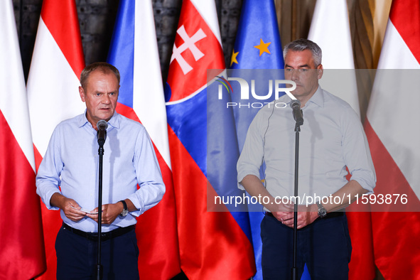 Polish Prime Minister Donald Tusk and Austrian Chacellor Karl Nehammer attend a press conference at the town hall in in Wroclaw, Poland on S...