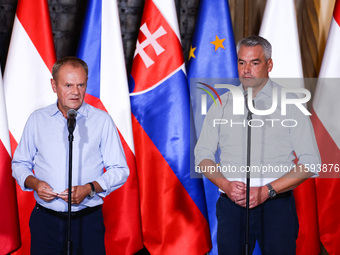 Polish Prime Minister Donald Tusk and Austrian Chacellor Karl Nehammer attend a press conference at the town hall in in Wroclaw, Poland on S...