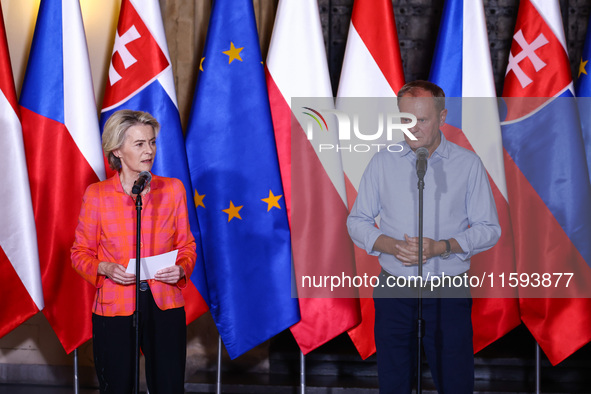 European Commission President Ursula von der Leyen and Polish Prime Minister Donald Tusk attend a press conference at the town hall in in Wr...