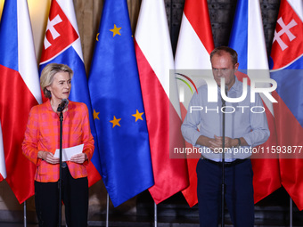 European Commission President Ursula von der Leyen and Polish Prime Minister Donald Tusk attend a press conference at the town hall in in Wr...